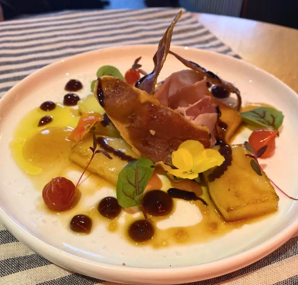 Antipasti board with Parma ham and bruschetta